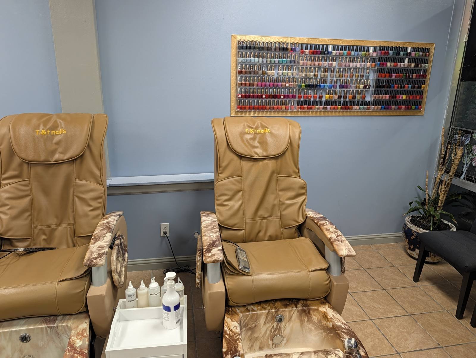 Two pedicure spa chairs embroidered with the T & T Nails logo in Bellingham, WA