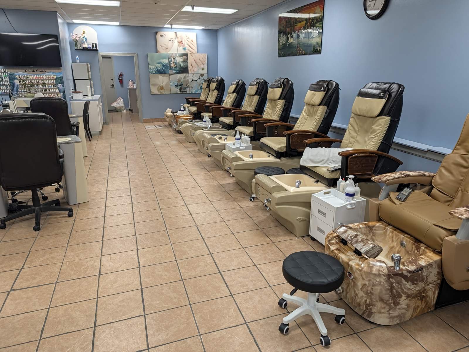 Row of pedicure spa chairs at T & T Nails in Bellingham, WA