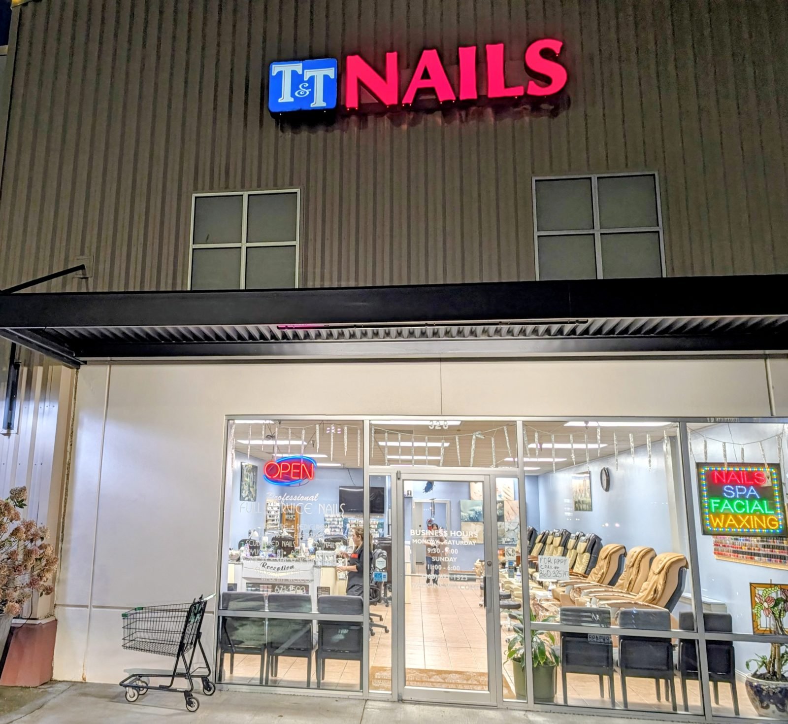 T & T Nails storefront at 328 36th St, Bellingham WA, with the lit red T&T NAILS sign